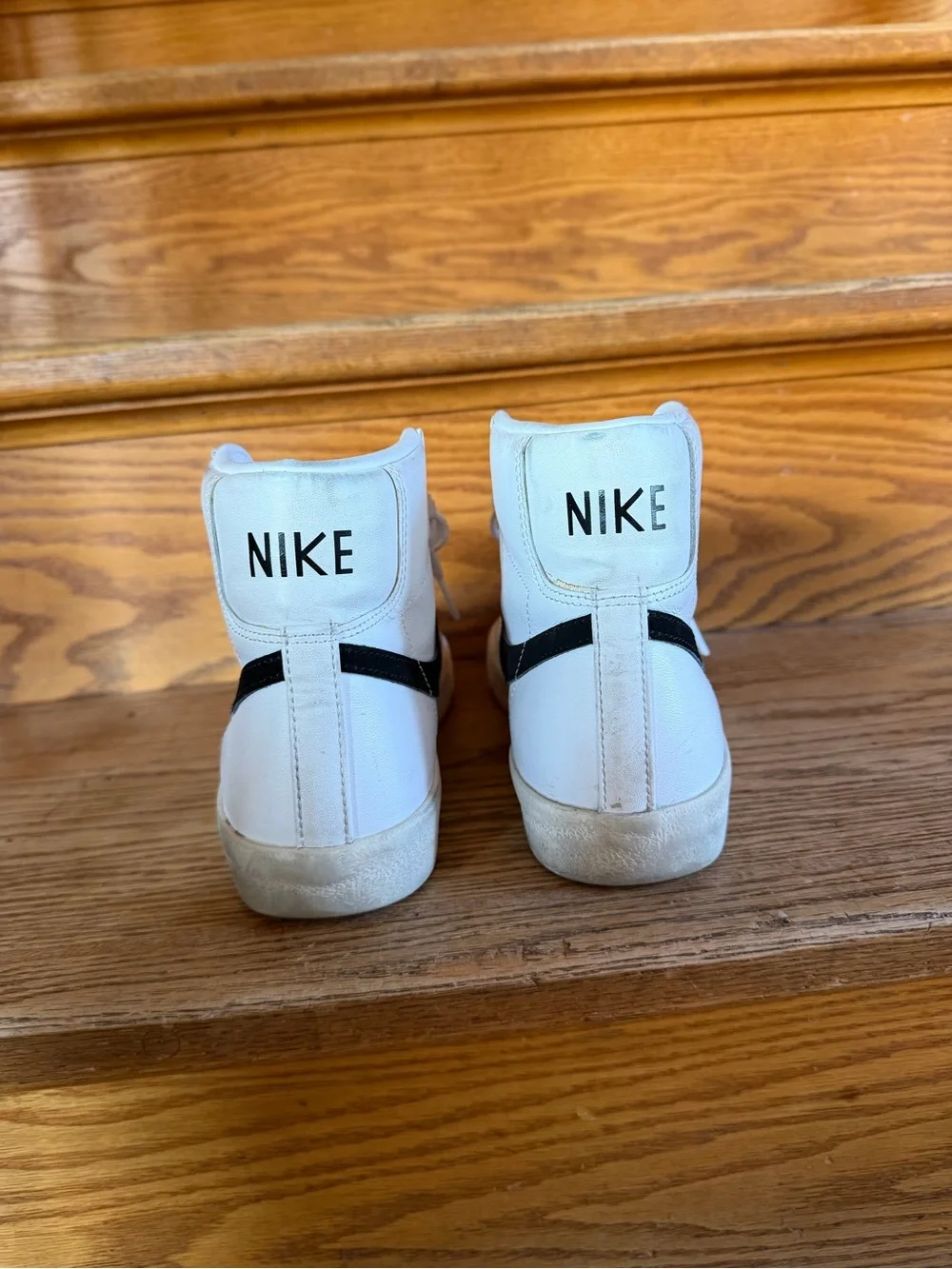 Nike Men’s White High-Top Sneakers with Black Swoosh Accents